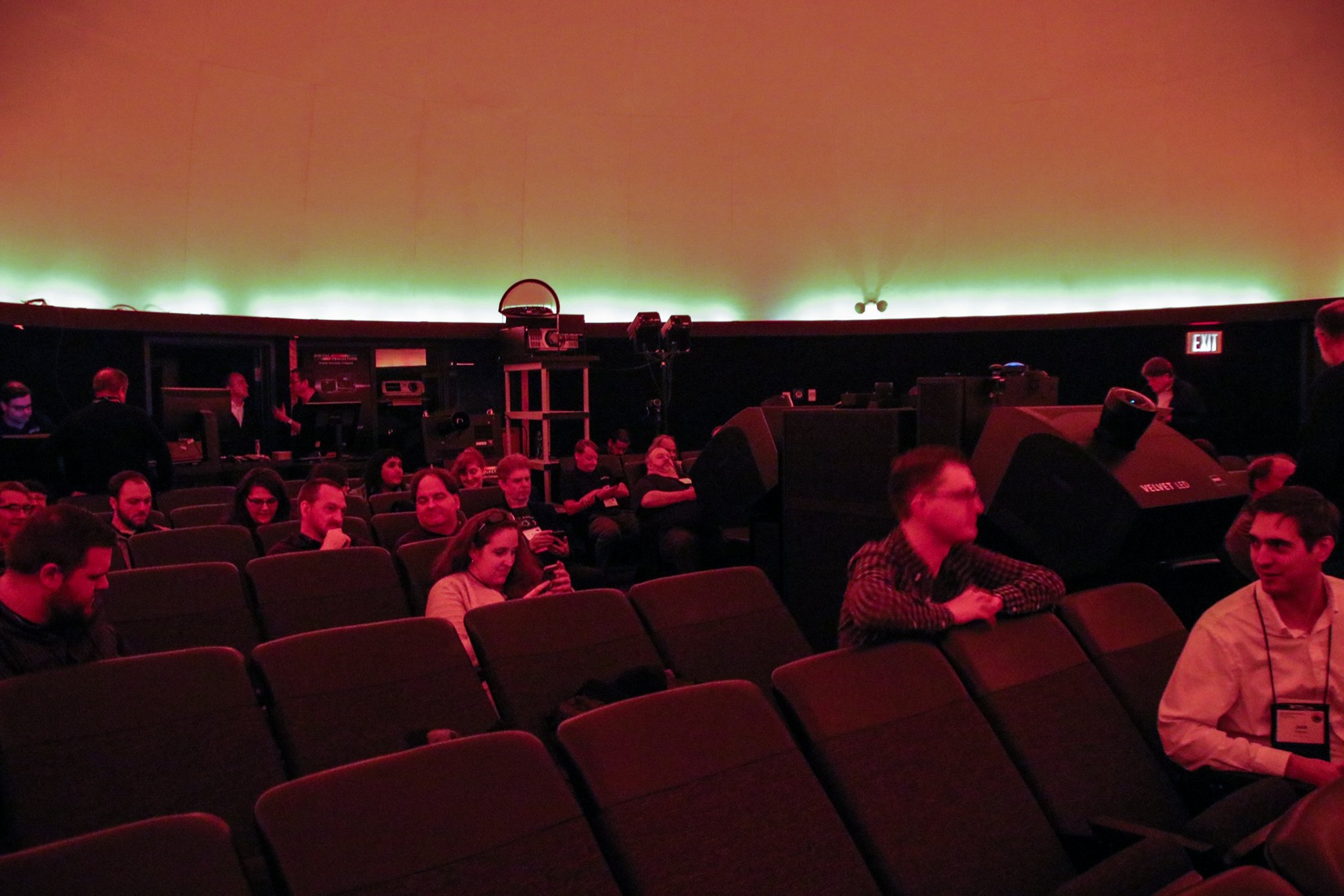 Members of GLPA sitting in a planetarium awaiting a vendor presentation.